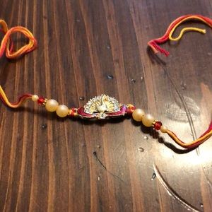 Bracelet with jeweled peacock